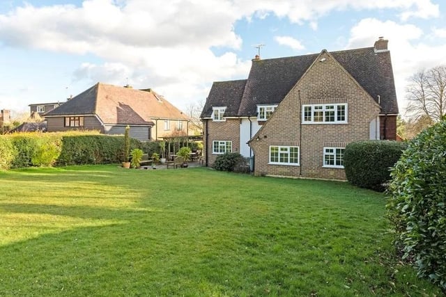 The home sits within a generous plot, which extends to roughly a third of an acre. Picture: Savills - Haywards Heath.