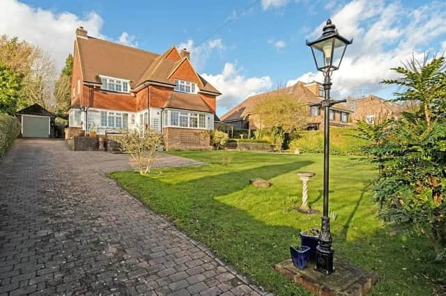 The home is believed to date from the 1950s and offers bright and spacious accommodation arranged over two floors. Picture: Savills - Haywards Heath.