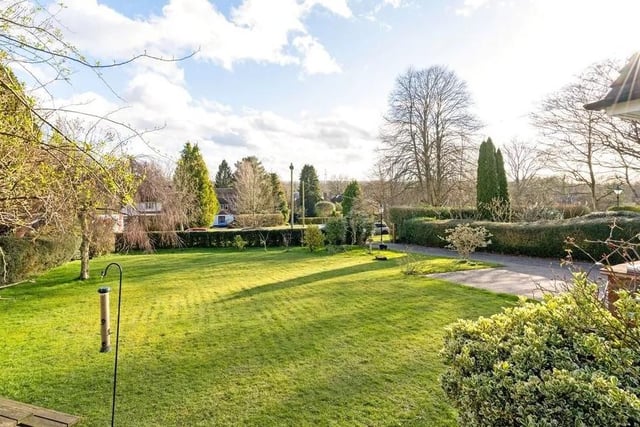 There are gardens at the front and rear of the home, which have been landscaped to provide separate areas for enjoying the sunshine throughout the day. Picture: Savills - Haywards Heath.