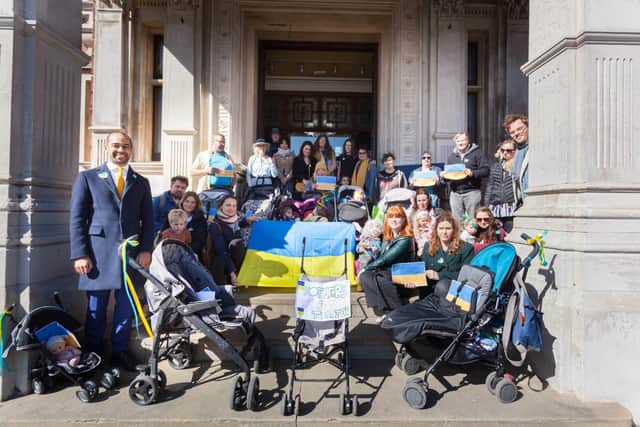 Mums from across Eastbourne called on the government to do more to help Ukrainian refugees during a rally at Town Hall on Friday (March 18). SUS-220321-161323001