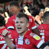 Jake Hessenthaler celebrates a Crawley Town goal against Swindon Town. Picture by Cory Pickford