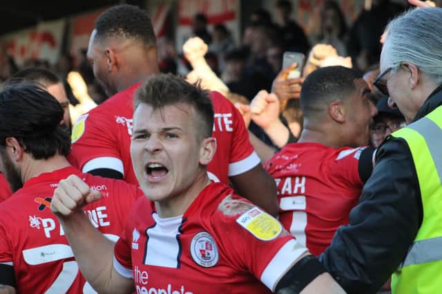 Jake Hessenthaler celebrates a Crawley Town goal against Swindon Town. Picture by Cory Pickford