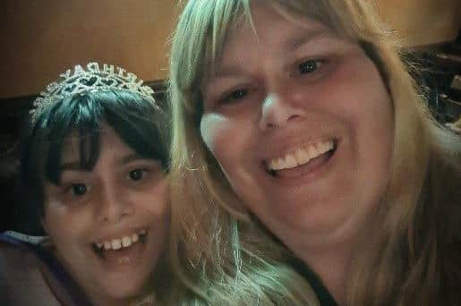 Alana Wilson with her daughter, who is on the autism spectrum and has ADHD