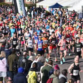 The runners pour over the start line / Picture: Justin Lycett