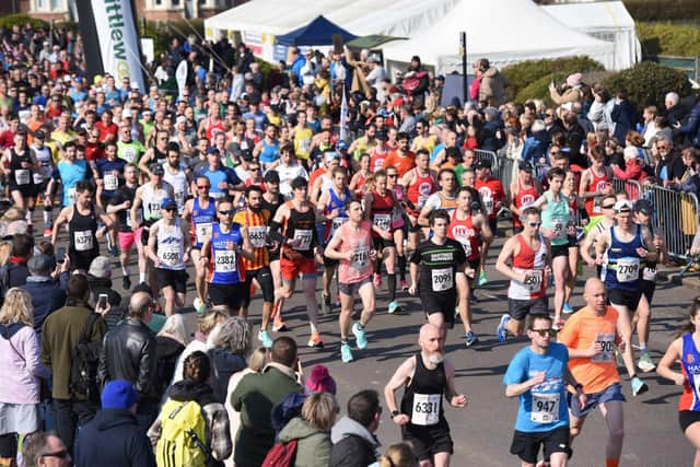 The runners pour over the start line / Picture: Justin Lycett