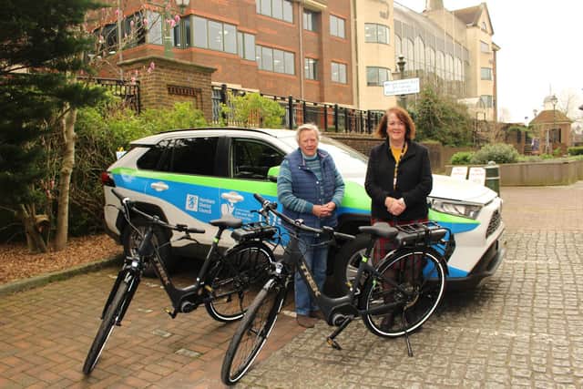 Horsham District Council Cabinet Member for Community Matters Cllr Liz Kitchen (left) and Cabinet Member for Public Protection Cllr Tricia Youtan with the new vehicles and bikes