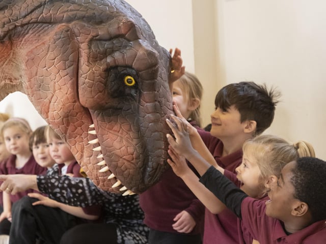 Sophie the animatronic T-Rex paid a visit to children at Lewes Old Grammar Junior School SUS-220323-102911001
