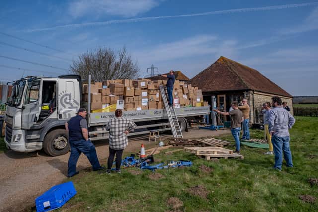 A lorry filled with aid from all over the Midhurst area is being loaded today (Monday March 21) to send to Ukraine

Pic: Graham Wittington SUS-220323-114048001
