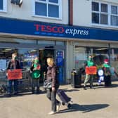 Greenpeace protesters outside Eastbourne Tesco stores. Photo from Greenpeace. SUS-220323-093508001