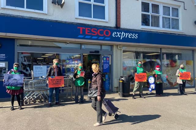 Greenpeace protesters outside Eastbourne Tesco stores. Photo from Greenpeace. SUS-220323-093508001