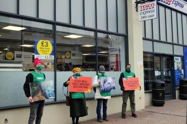 Greenpeace protesters outside Eastbourne Tesco stores. Photo from Greenpeace. SUS-220323-093518001