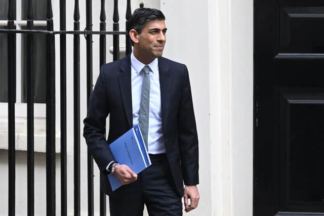 Chancellor of the Exchequer Rishi Sunak leaves 11 Downing Street for the House of Commons to deliver his Spring Statement
