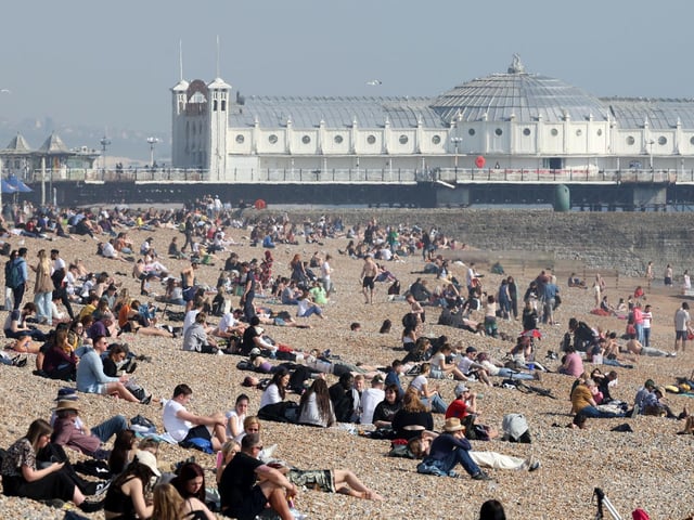 Making the most of the mild March weather on Brighton beach