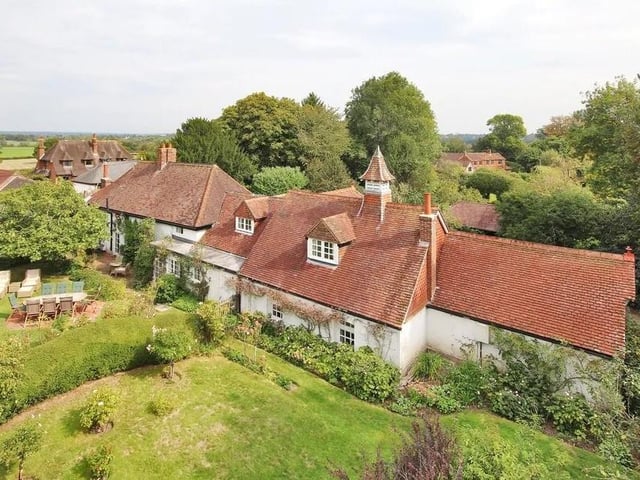 There are large lawned areas and an orchard at the property. Picture: Jackson-Stops Lindfield.