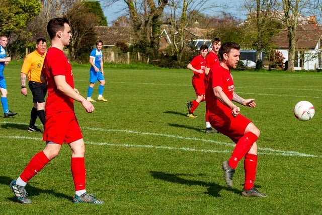 Action from Jarvis Brook's 3-1 win at Bosham in division two of the SCFL / Picture: Tommy McMillan