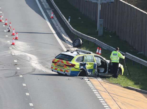 A five-car collision on the M23 included two police cars, which were 'not part of the pursuit'. Photo: Eddie Mitchell