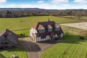 The guide price for Woodside Farm is £1,800,000, and it is being sold by agents Strutt and Parker via Zoopla. SUS-220328-092221001