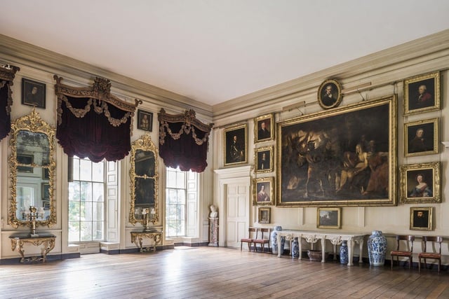 The Square Dining Room at Petworth House and Park, West Sussex. The large painting is Reynold's `Macbeth & the Witches' and beneath are porcelain vases of the K'ang Hsi period. The Red Room at Petworth House and Park, West Sussex, ©National Trust Images Andreas von Einsiedel