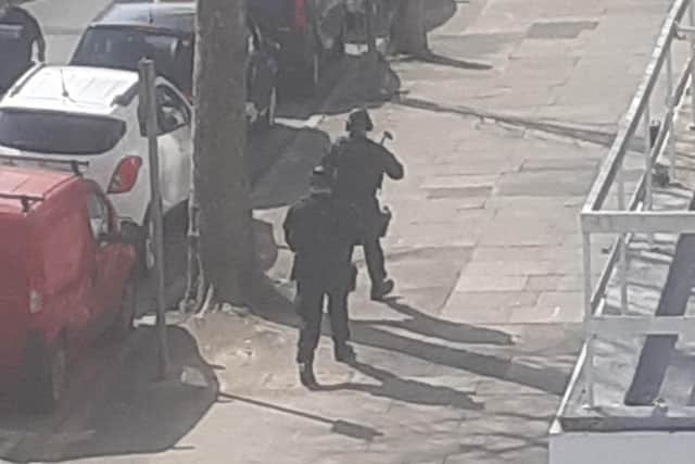 Suspected armed police in Pevensey Road, Eastbourne. Picture from Samuel Jenkins SUS-220328-111448001