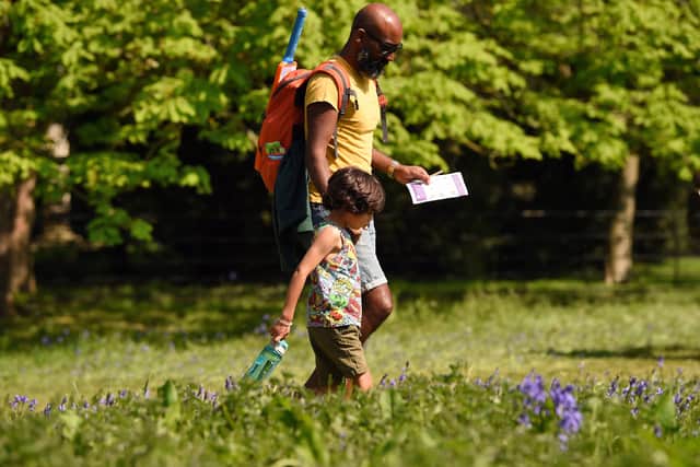 Visitors completing the Cadbury Easter Egg Hunt in the Great Meadow at Osterley Park and House, London. National Trust image.