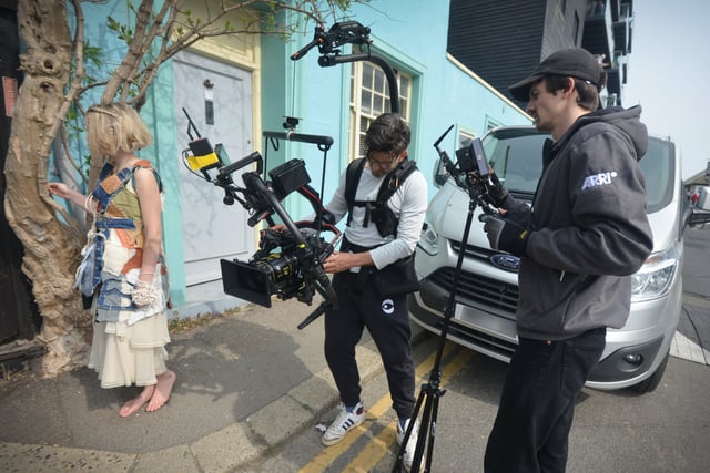 Filming of a trailer for The Tempest in Rock-a-Nore Road, Hastings. Featuring Raffiella Chapman. SUS-220329-080344001
