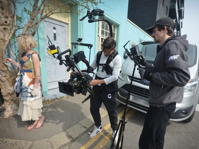 Filming of a trailer for The Tempest in Rock-a-Nore Road, Hastings. Featuring Raffiella Chapman. SUS-220329-080344001