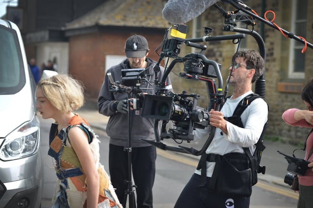Filming of a trailer for The Tempest in Rock-a-Nore Road, Hastings. Featuring Raffiella Chapman. SUS-220329-080514001