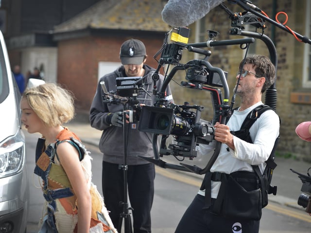 Filming of a trailer for The Tempest in Rock-a-Nore Road, Hastings. Featuring Raffiella Chapman. SUS-220329-080514001