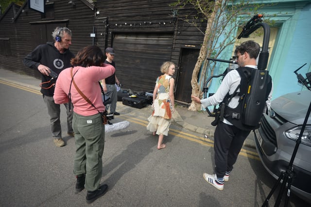 Filming of a trailer for The Tempest in Rock-a-Nore Road, Hastings. Featuring Raffiella Chapman. SUS-220329-080416001