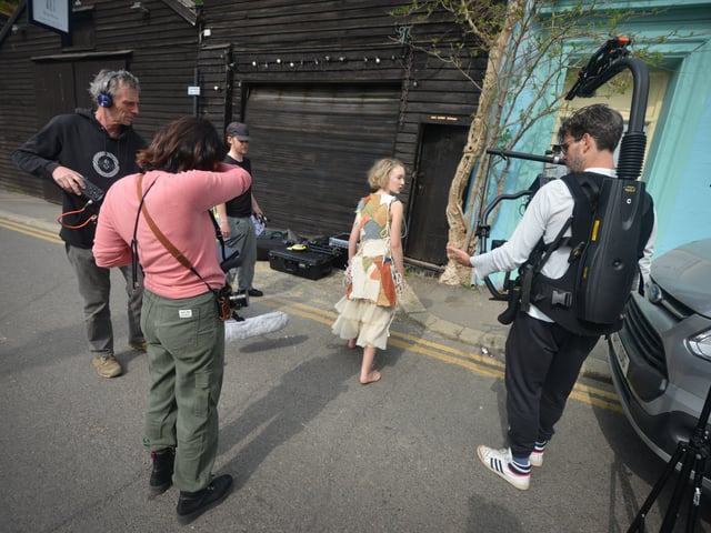 Filming of a trailer for The Tempest in Rock-a-Nore Road, Hastings. Featuring Raffiella Chapman. SUS-220329-080416001
