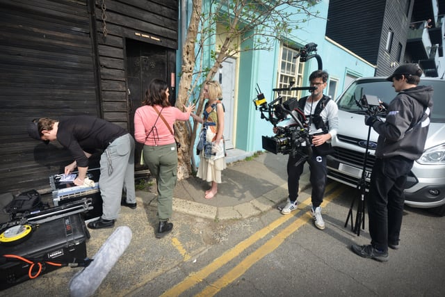 Filming of a trailer for The Tempest in Rock-a-Nore Road, Hastings. Featuring Raffiella Chapman. SUS-220329-080400001