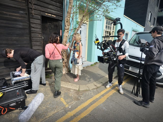 Filming of a trailer for The Tempest in Rock-a-Nore Road, Hastings. Featuring Raffiella Chapman. SUS-220329-080400001