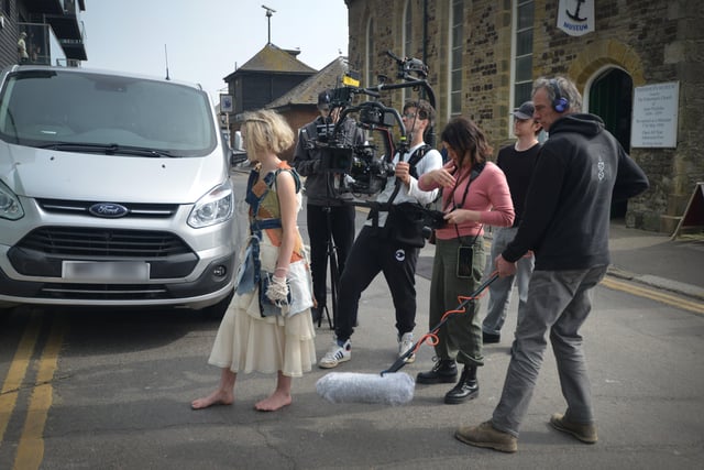 Filming of a trailer for The Tempest in Rock-a-Nore Road, Hastings. Featuring Raffiella Chapman. SUS-220329-080441001