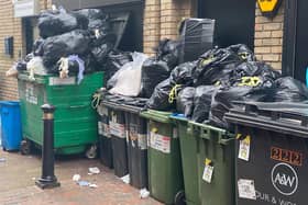 Bin collections will resume today after four weeks of strike action. Photo: Eddie Mitchell
