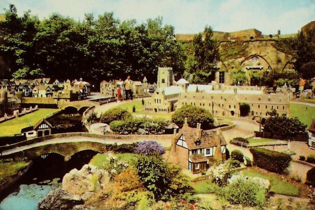 n 1957, the Parade Ground was transformed by Benjamin White into a model village, complete with miniature manor house, market square and Abbey. Tonnes of soil were brought into the Redoubt and a river with running water was created. For around 20 years, the Model Village was a popular attraction.   Pictures courtesy of Eastbourne Heritage Service SUS-141004-093727001