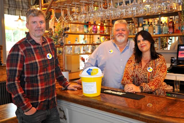 Richard Paisley with Tim and Lainey Powell at The Horse Inn Hurst in Hurstpierpoint. Picture: Steve Robards, SR2203291.