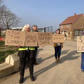 Hellingly residents protesting by a construction site SUS-220329-172304001