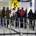 Passengers ready to check-in at the reopened South Terminal at Gatwick Airport on Monday, March 28