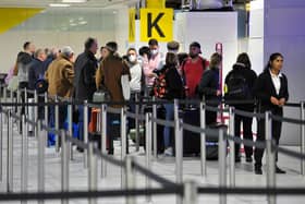 Passengers ready to check-in at the reopened South Terminal at Gatwick Airport on Monday, March 28