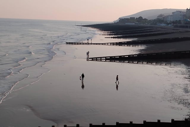 "As a Belgian national I fell in love with Eastbourne and the south coast.," said Anne-Marie Wilson, who sent in this photograph of the beach at low tide, taken from the pier. SUS-220330-085553001