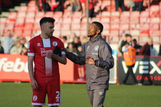 Lewis Young with Archie Davies after Saturday's win against Rochdale. Picture by Cory Pickford