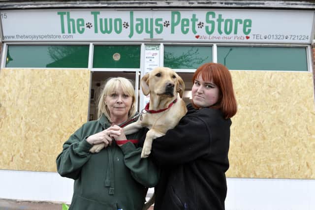 Lynne Hylands, owner of 'The Two Jays Pet Store' and Elysia with Ticket The Golden Labrador (Photo by Jon Rigby) SUS-220330-132629008