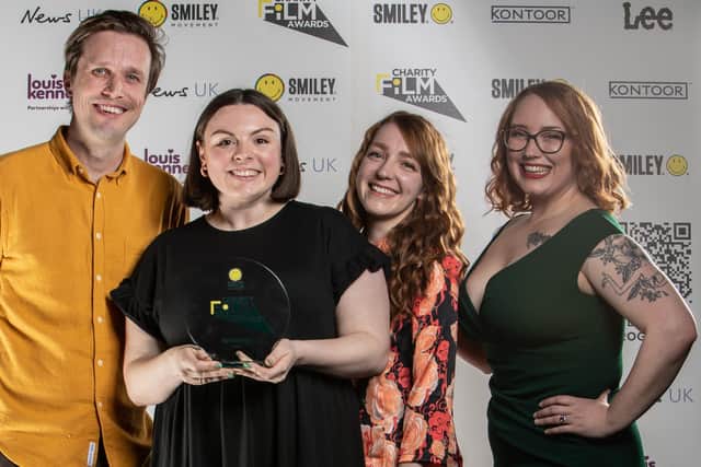 Sightsavers staff accept their Charity Film Award. Picture: Smiley News.