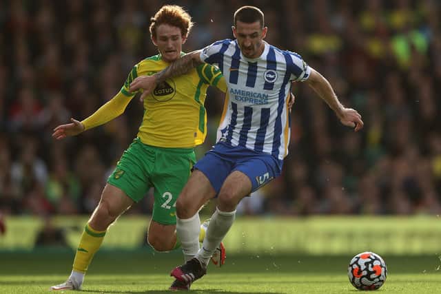 Brighton's Lewis Dunk tangles with Norwich's Josh Sargent during October's goalless draw at Carrow Road. Picture by Julian Finney/Getty Images