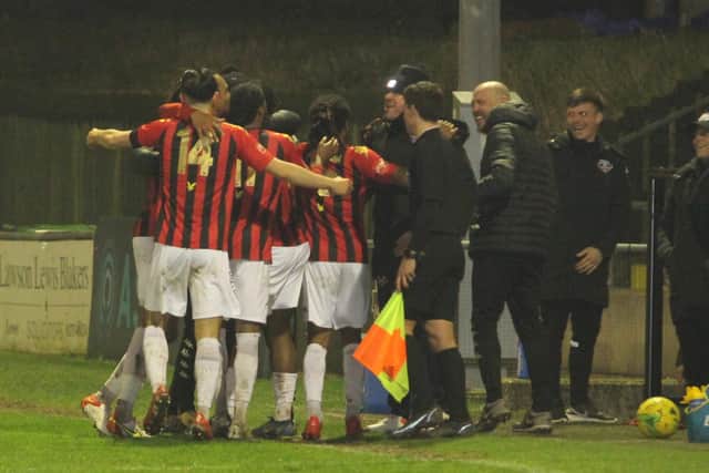Lewes players and staff celebrate one of the goals that downed Margate in midweek / Picture: Angela Brinkhurst