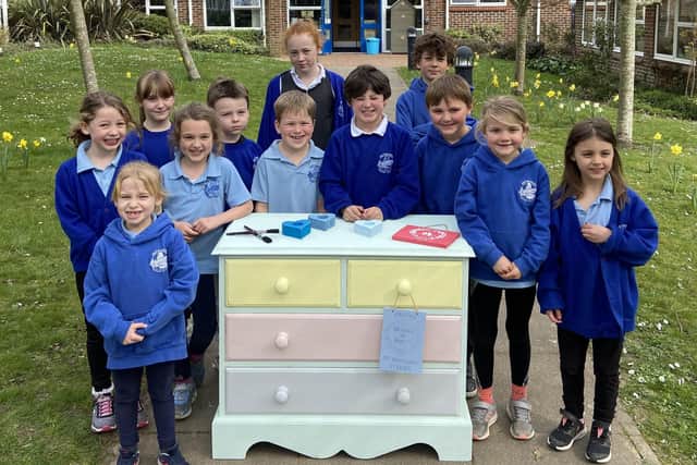 Petworth Primary School children with their chest of drawers