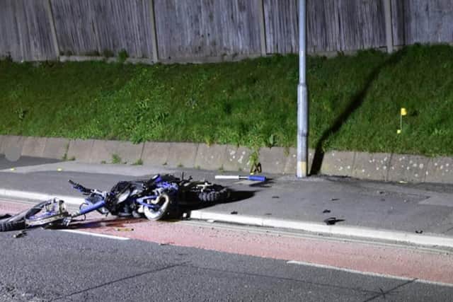 Stockdale's motorbike after the collision. Witnesses reported seeing the motorbike being driven at excess speed into a 30mph bend, causing it to lose control and leave the road. SUS-220331-161242001
