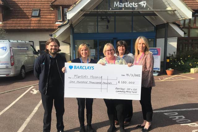 The Martlets telephone hub team in the photo Tracy Keeley, Amanda Bell, Carron Maskell and Tina Phillips with Richard Pink from Barclays