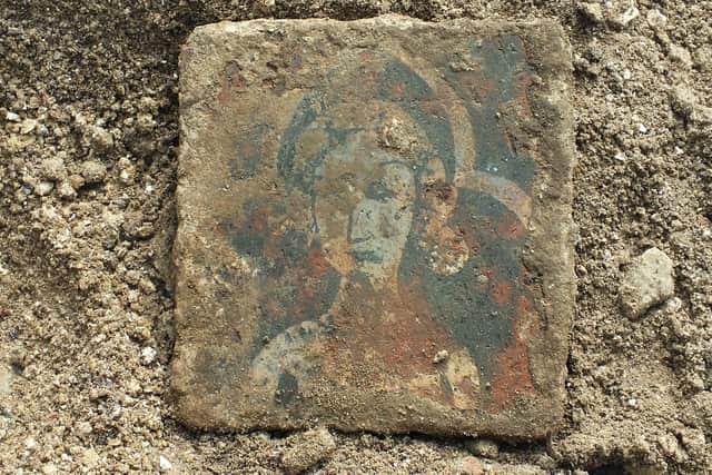 Medieval tile excavated at Old St Helen's Church communnity dig.
Photo by Alan Harding ENGSUS00120120420161736
