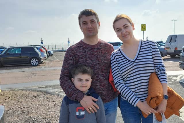 Sergii Misnianko, 41, his 33-year-old wife, Anastasia, and their eight-year-old son, Misha, after arriving in the UK on March 25 SUS-220104-102401001